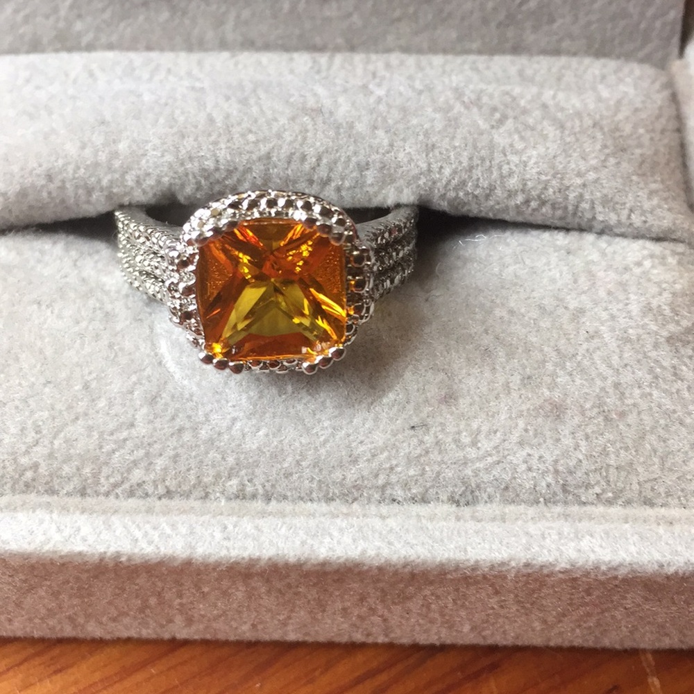 Pretty silver and gold topaz ring